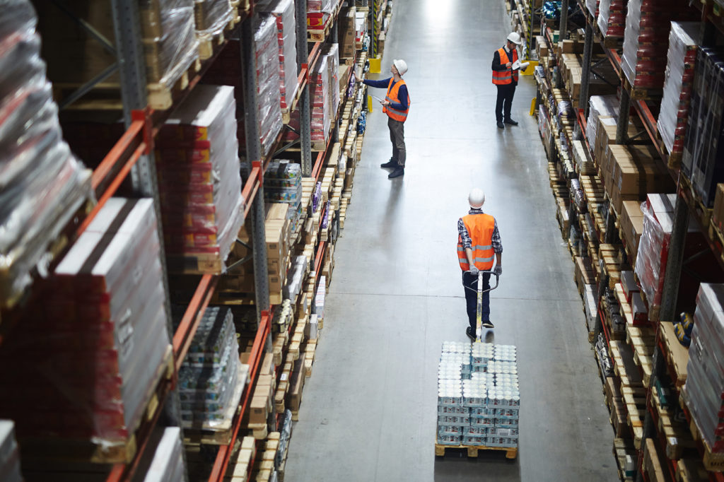 Busy workers inside storehouse of hypermarket